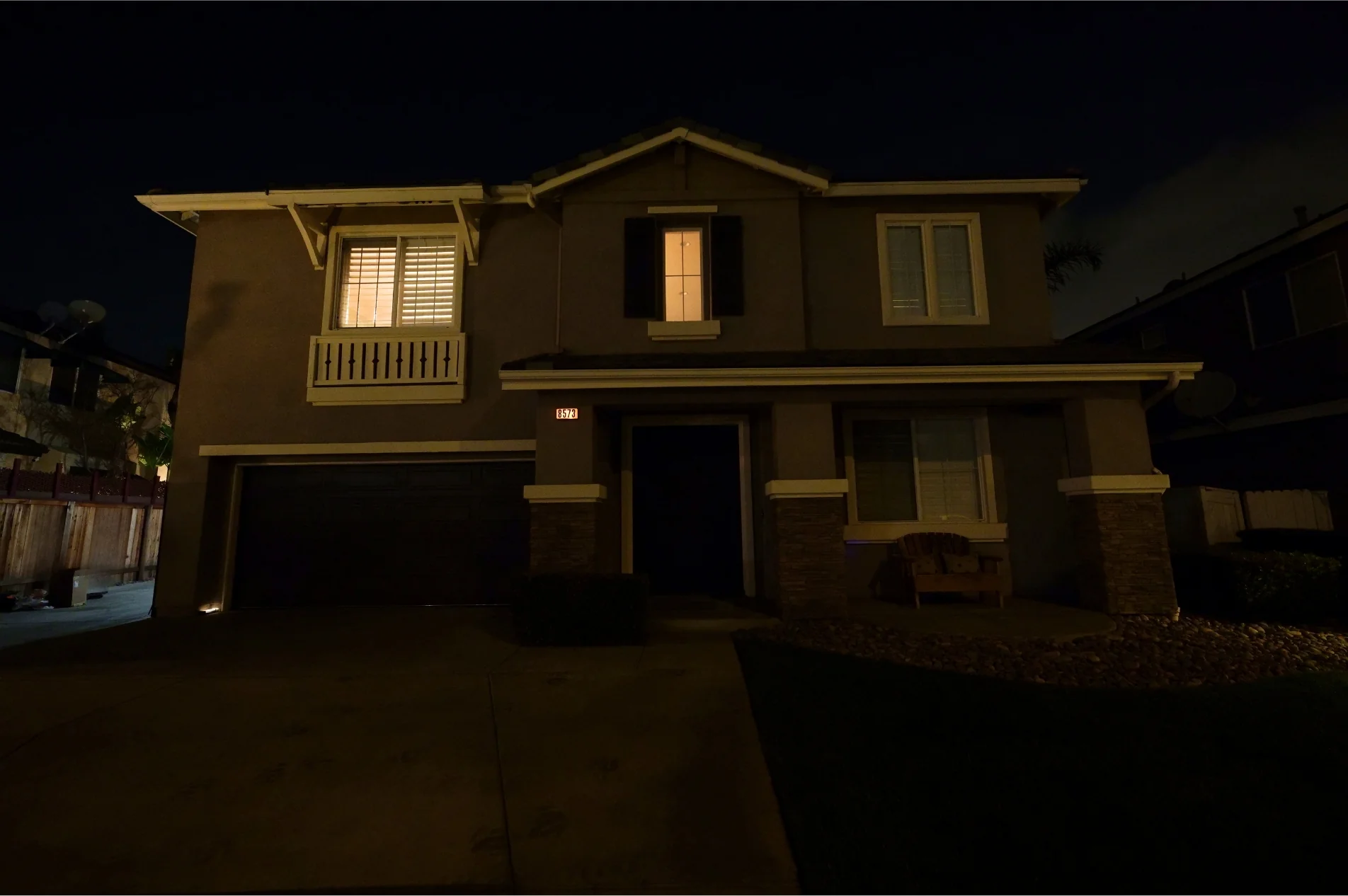 Home in daytime, lighting hidden in the architecture